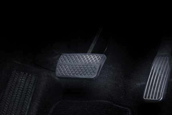 Close-up of brake pedal in footwell of car
