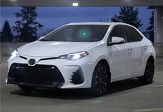 A white Toyota Corolla