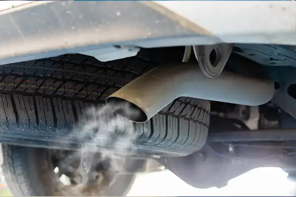 vehicle exhaust emitting smoke 